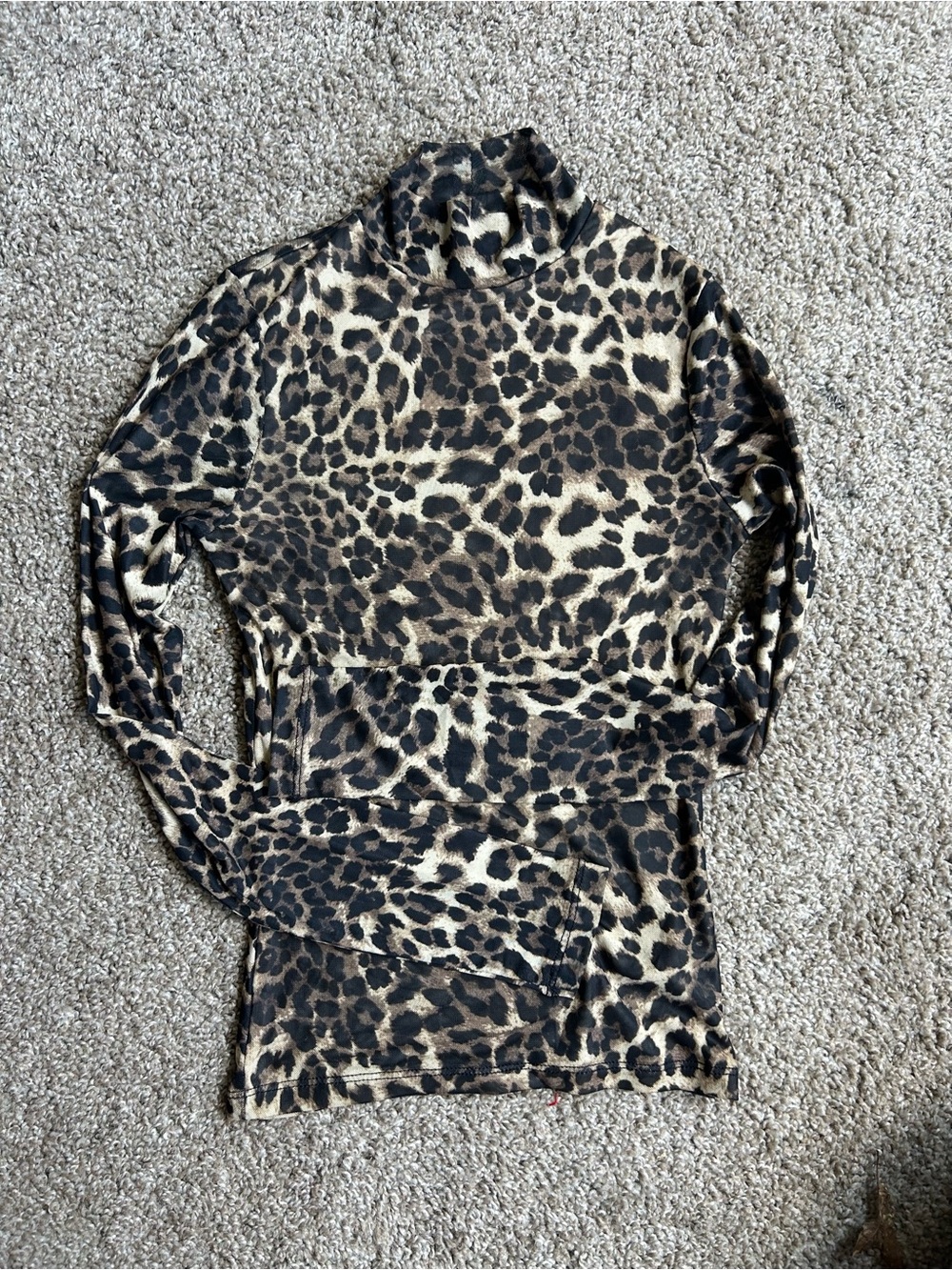 Sheer animal print turtle neck